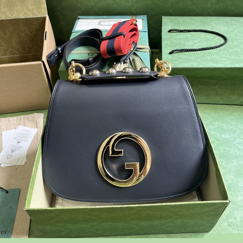 G*u*i top handle bags